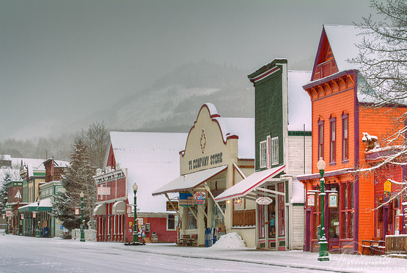 snow on colorful buildings of downtown Crested Butte Colorado