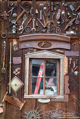 Tools rust outside while skis are protected in a Crested Butte barn